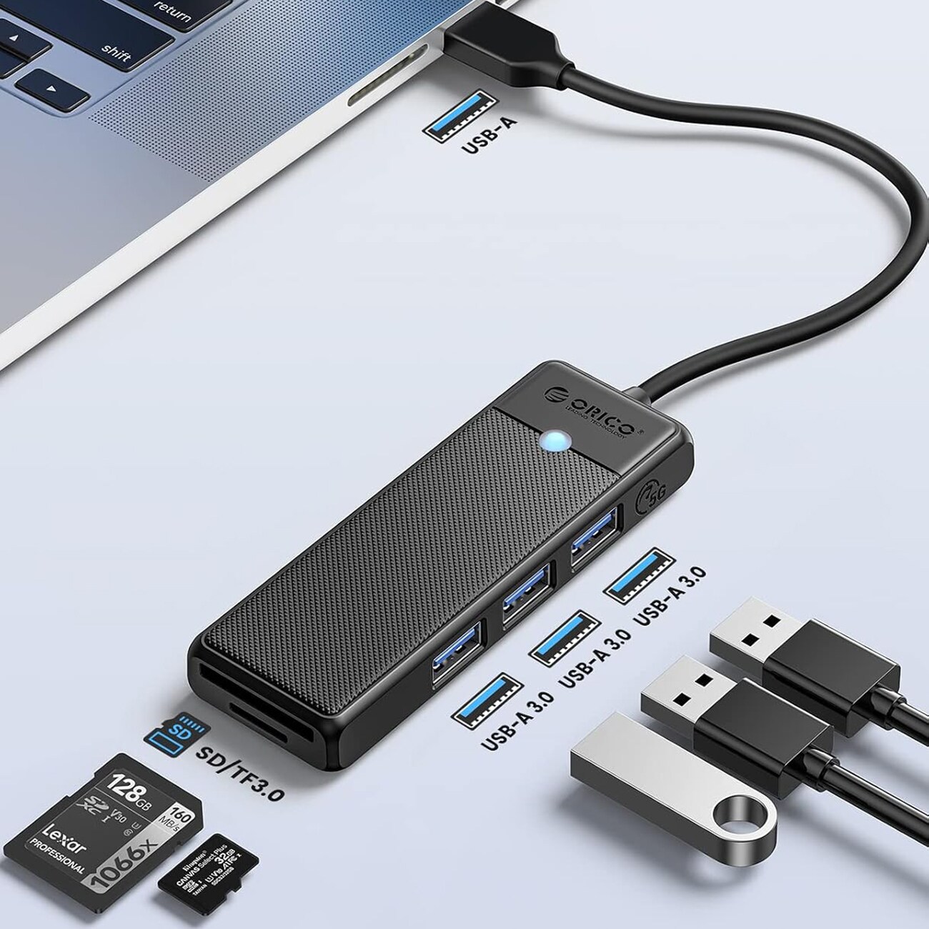 Orico PAPW3AT-U3 USB-hubb med 4 portar (3x USB-A 3.0) och microSD-/SD-kortläsare, 1 m – svart